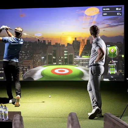 Playing a target game on the screen.