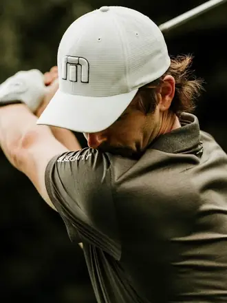 Close-up of a player at the top of the backswing.
